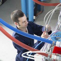 Technician in a factory building